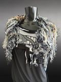 Knit Black White poncholette with fringe and animal prints, couture fashion