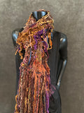 Hand knit Boho style fringed scarf in autumn shades