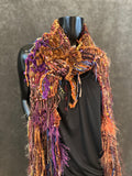 Hand knit Boho style fringed scarf in autumn shades