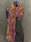 Hand knit Boho style fringed scarf in autumn shades