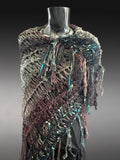 Boho artistic handmade poncho with fringe in teal green shades, statement fashion shawl