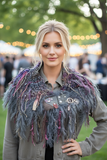 Blonde model wearing luxury handspun cowl at outdoor event