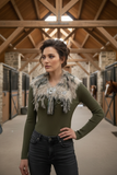 Brunette model with cowl in rustic barn