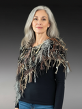 Handmade Knit Poncho: Bohemian or Avant Garde Fringed shoulder wrap